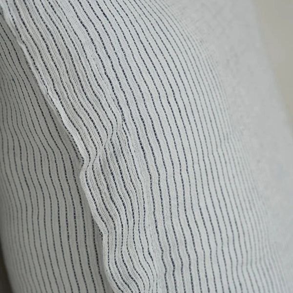 Pisco linen cushion cover styled on sofa Barcelona design