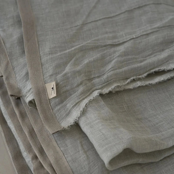 Linas throw folded reversible linen sage grey ecru